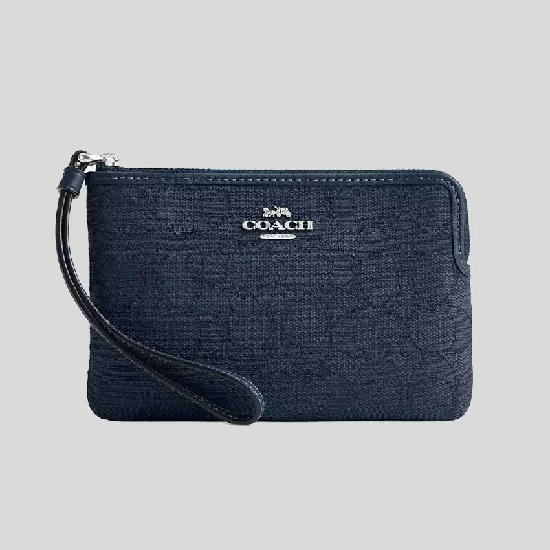 COACH Corner Zip Wristlet In Signature Jacquard Dark Denim CW862